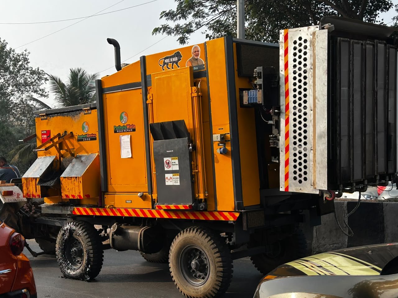 ProGenius PRO RMV 2T pavement road repair machine at a job site